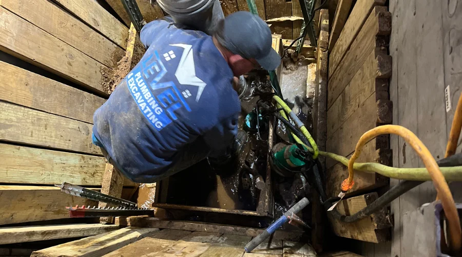 Level Sewer and Drain crew inspecting emergency sewer burst