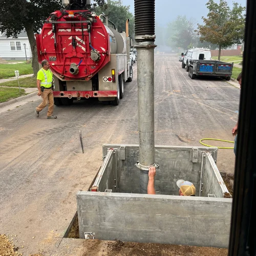 heavy equipment aiding level sewer and drain experts replace sewer line