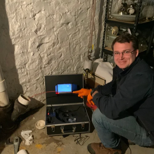 level sewer and drain staff using professional camera for pipe inspection