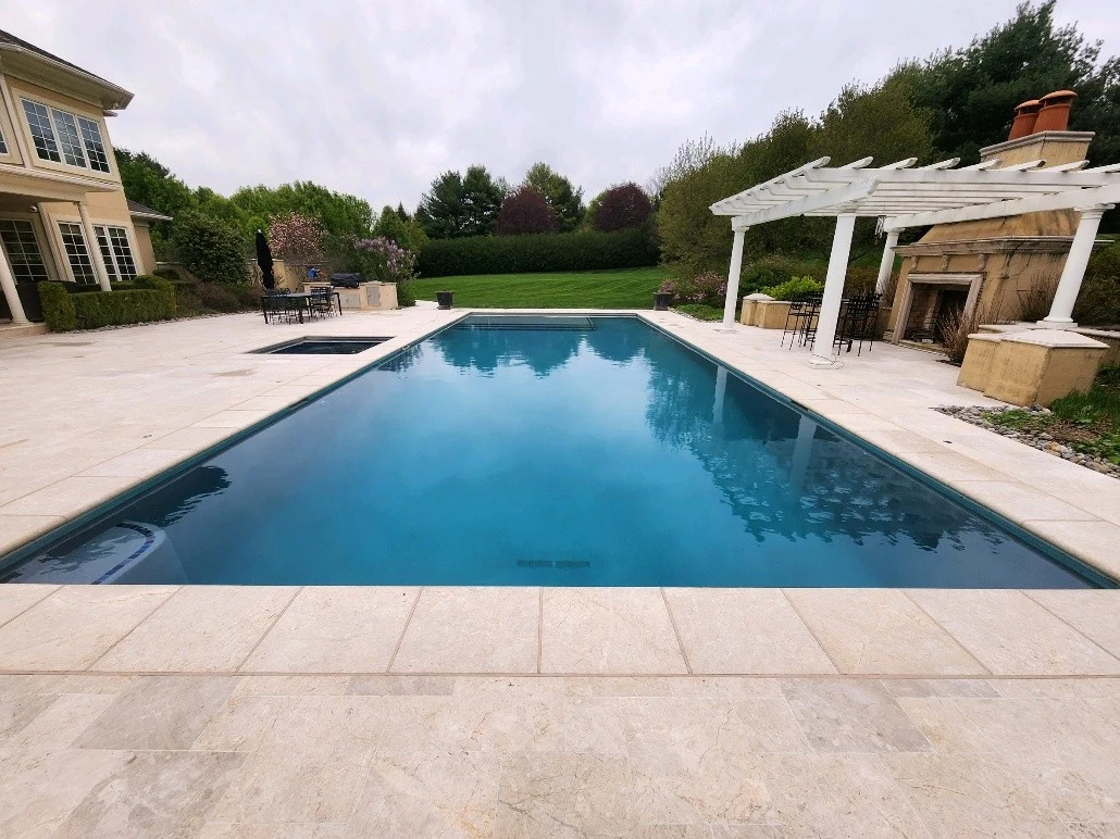 rectangular-pool-with-pergola-and-fireplace