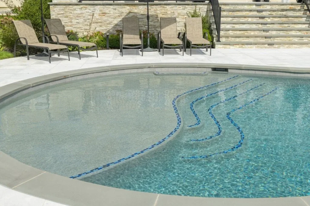 roman-end-pool-with-steps-and-loungers