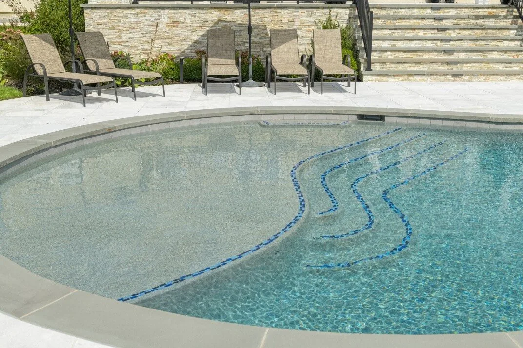 roman-end-pool-with-steps-and-loungers