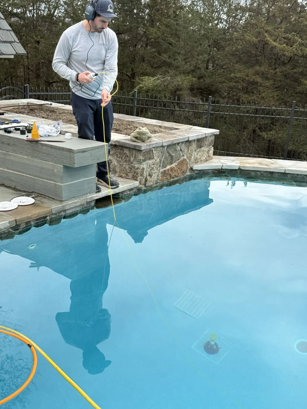 technician-testing-pool-water