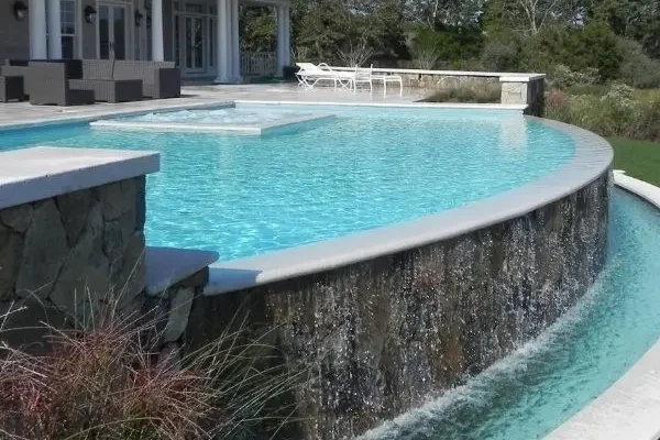 curved pool landscaping Hamptons property
