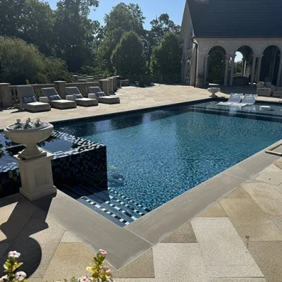 estate-pool-with-stone-house