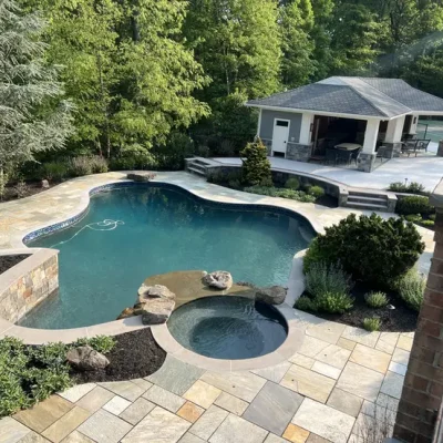 freeform-pool-and-spa-with-cabana-aerial