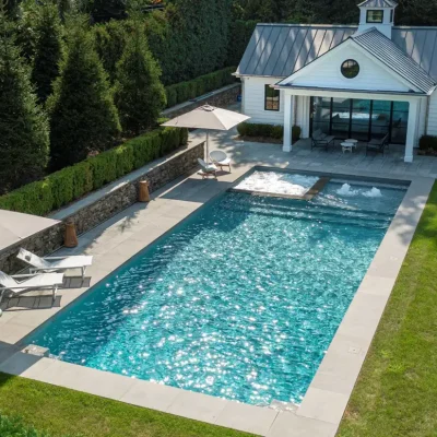 rectangular-pool-with-pool-house-and-lawn